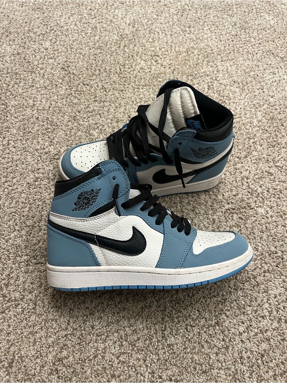 Authentic Jordan 1 Retro High OG in University Blue/White with Black Swoosh